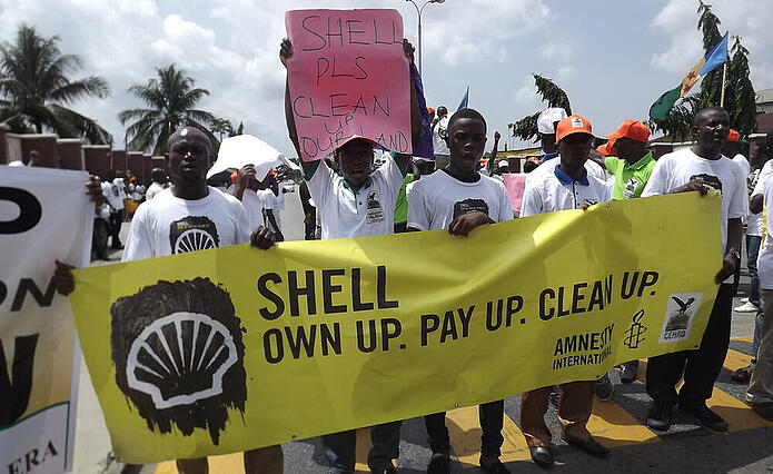 En Port Harcourt (Nigeria), activistas, organizaciones asociadas y Amnistía Internacional pidieron a Shell que asumiera su responsabilidad, pagara y limpiara el Delta del Níger, como parte de una semana de acción celebrada en abril de 2012.